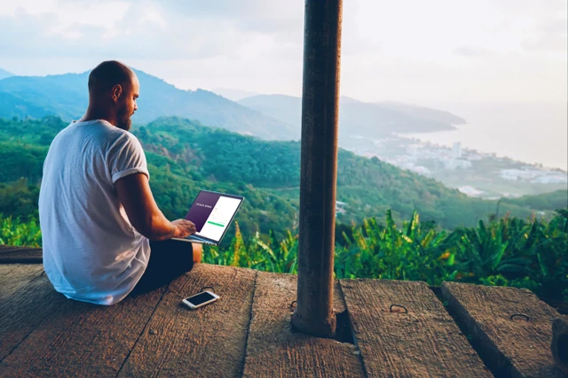 Zenus Bank Man Using Laptop Banking