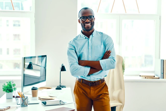 Zenus Bank Man Standing By Desk