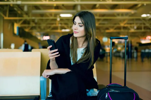 Zenus Bank Women On Phone In Airport
