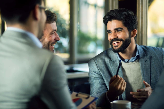 Zenus Bank Men Discussing